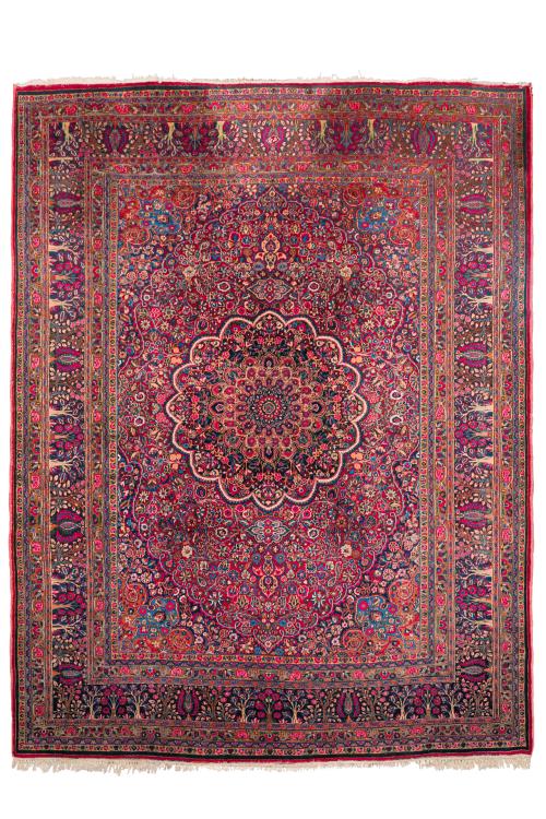 223   -  <p><span class="object_title">Gran alfombra persa en lana con profusa decoración vegetal y florón central sobre campo granate. </span><br></p>