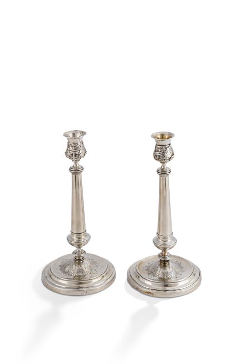 168   -  <p><span class="object_title">Finísima pareja de candeleros en plata española punzonada con marcas de Barcelona, Jacinto Carreras,  S. XIX. </span><br></p>