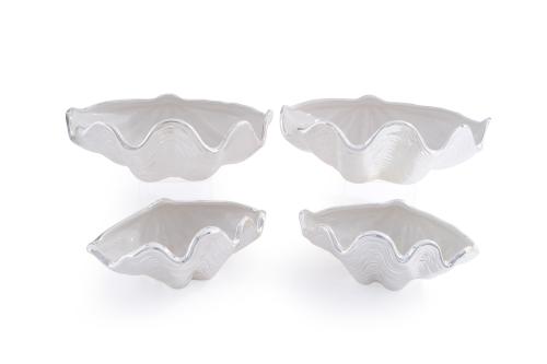 352   -  <p><span class="object_title">Juego de cuatro conchas en porcelana para mariscos. </span><br></p>