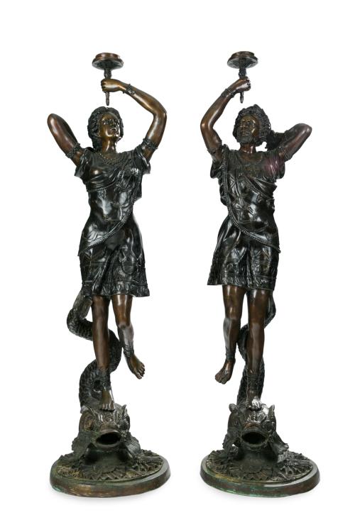 116   -  <p><span class="object_title">Grandes torcheros en bronce, C. 1900. Pareja de personajes orientalistas sobre tritones.</span><br></p>