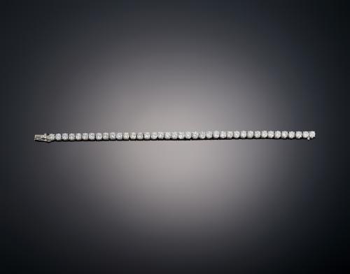 801   -  <p><span class="object_title">PULSERA RIVIERE CON DIAMANTES TALLA BRIILANTE</span></p>