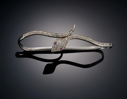 922   -  <p><span class="object_title">PULSERA DE PALMA CON FORMA DE SERPIENTE </span></p>