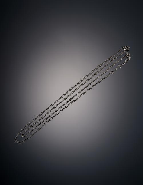 921   -  <p><span class="object_title">CADENA DE PLATA Y DIAMANTES NEGROS </span></p>