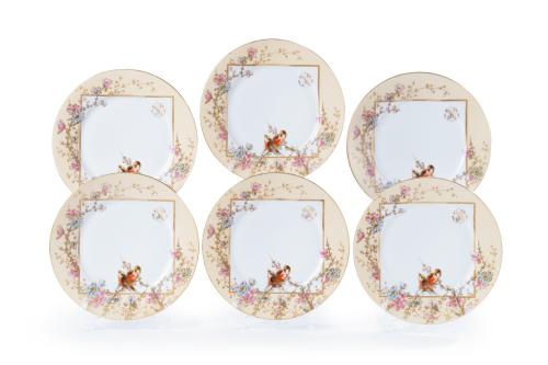 Juego de seís platos Noucentistas en porcelana. C. 1910