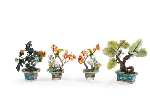 Lote de cuatro arbolitos de jade tallado, China, S. XX. 