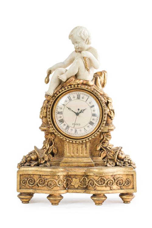 389   -  <p><span class="object_title">Reloj de sobremesa de estilo Luis XVI en madera tallada y dorada con remate de niño en resina. Ppios S. XX. </span><br></p>