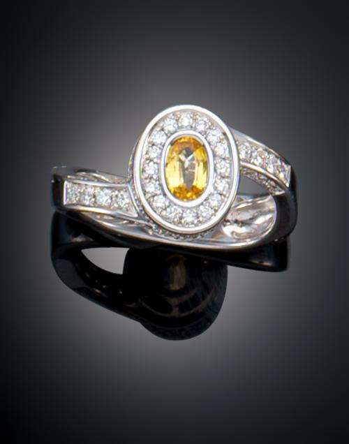 940   -  <p><span class="object_title">ANILLO EN ESPIRAL CON ZAFIRO Y DIAMANTES </span></p>
