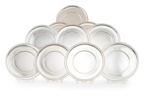 266 - <p><span class="object_title">Juego de 10 bajoplatos en plata española punzonada, ley 925, con marcas de Montejo. Modelo cordón. </span><br></p>