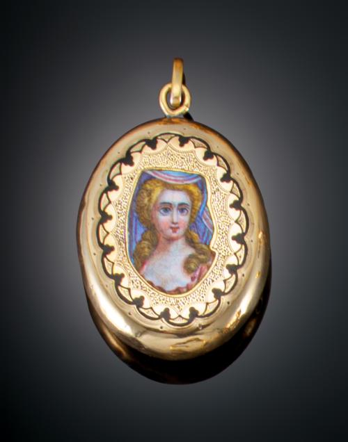 922   -  <p><span class="object_title">GUARDAPELO ESMALTADO CON IMAGEN FEMENINA</span></p>