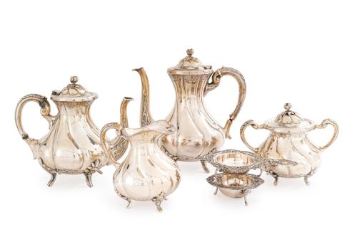 Juego de café y té en plata punzonada, ley 900, con cuerpo 