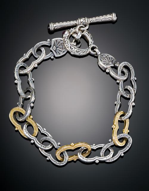 PULSERA CON ESLABONES EN ORO AMARILLO Y BLANCO 
