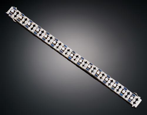 PULSERA CON ZAFIROS Y DIAMANTES EN ORO AMARILLO Y VISTAS EN