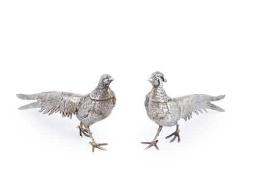 Pareja de faisanes en metal plateado.