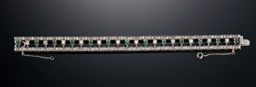 672   -  <p><span class="object_title">Pulsera  de oro blanco de 18kts con diamantes y esmeraldas </span></p>