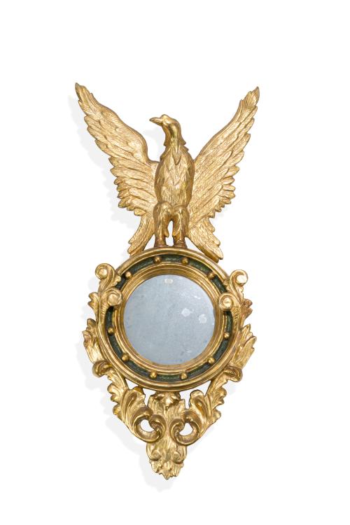 272   -  <p><span class="object_title">Espejo de estilo "Regency", Inglaterra, S. XX.<br/>En madera tallada y dorada con decoración de tornapuntas vegetales y "c", copete con águila.</span><br></p>