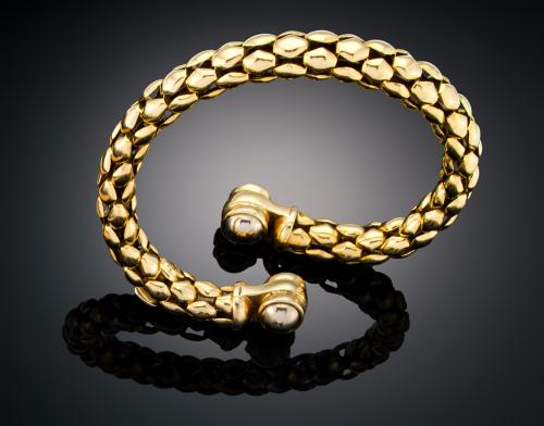 PULSERA ESTILO TORQUE EN ORO AMARILLO DE 18 K