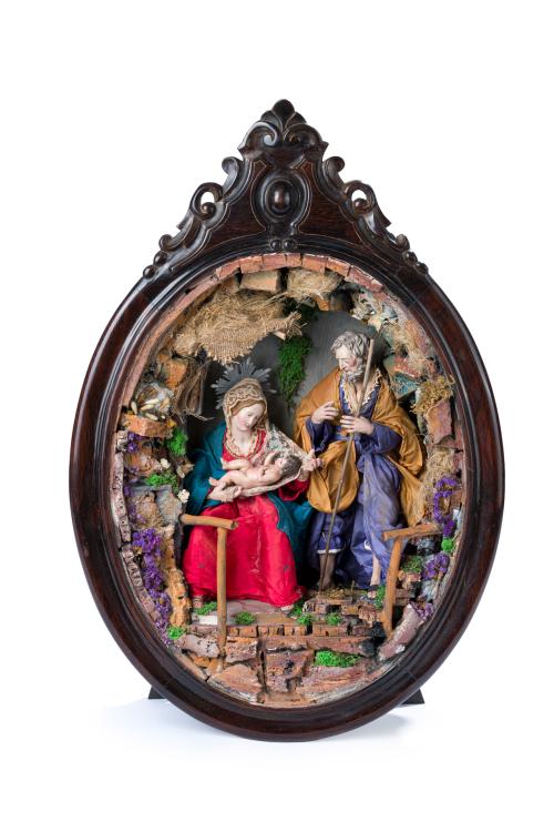 598   -  <p><span class="object_author">ESCUELA NAPOLITANA. Siglo XIX - Pesebre napolitano (Sagrada Familia)</span></p>
