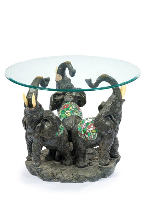 Mesa centro circular de estilo Tiffany. Patas a modos de 