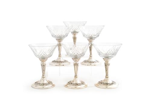 Juego de 6 copas de champagne en cristal con fuste en plata.