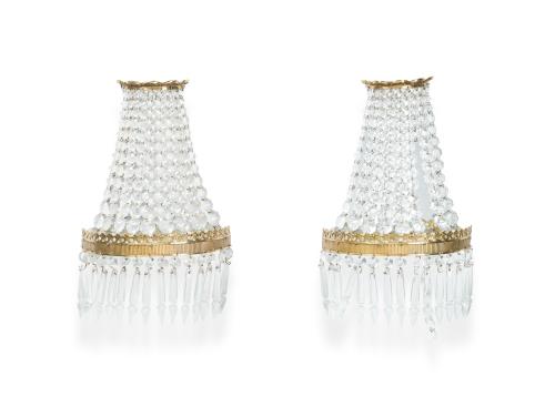 Pareja de pequeños apliques de estilo Imperio en dorado con