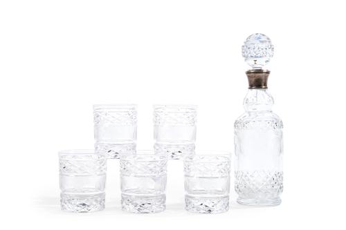 Juego en cristal tallado formado por licorera con embocadur