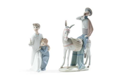 LLADRÓLote de dos figuras en porcelana esmaltada. "Jove