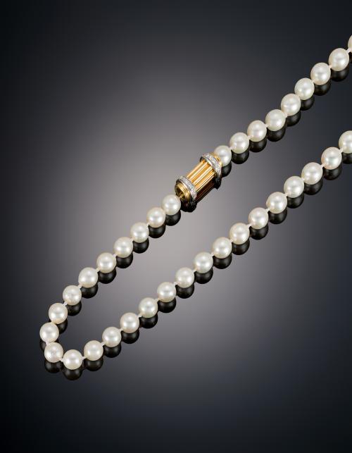 588   -  <p><span class="object_title">COLLAR PERLAS CULTIVADA CON BROCHE DE ORO Y DIAMANTES</span></p>