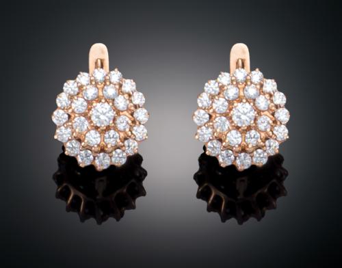 PENDIENTES DOBLE ORLA DE PIEDRAS  INCOLORAS SINTÉTICA EN OR