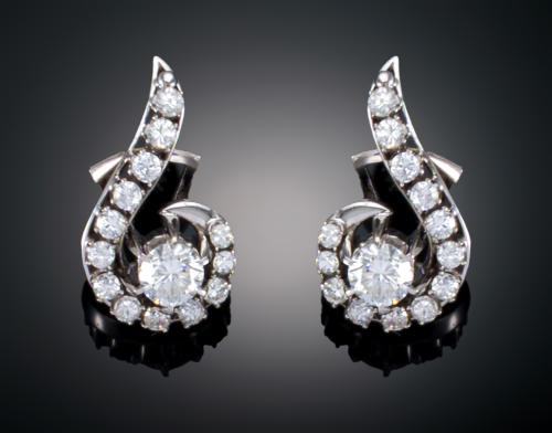 PENDIENTES ESPIRAL CON DIAMANTES EN ORO BLANCO DE 18 K 