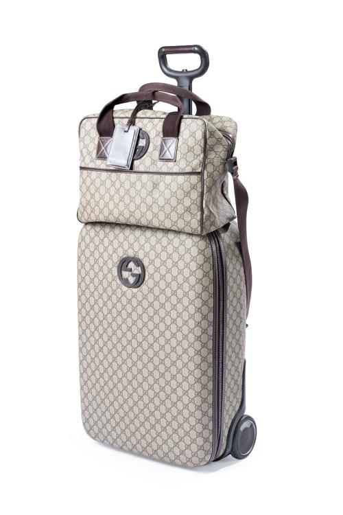 GUCCI, Lote de maleta de ruedas y bolsa de viaje.
