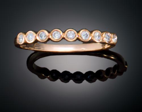 SORTIJA CON PEQUEÑOS DIAMANTES EN ORO AMARILLO DE 18 KT