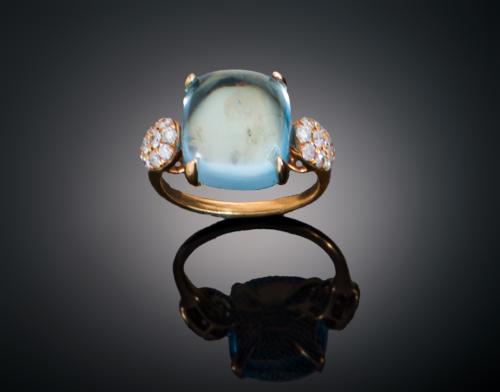 SORTIJA CON TOPACIO AZUL Y DIAMANTES EN ORO ROSA DE 18 KT