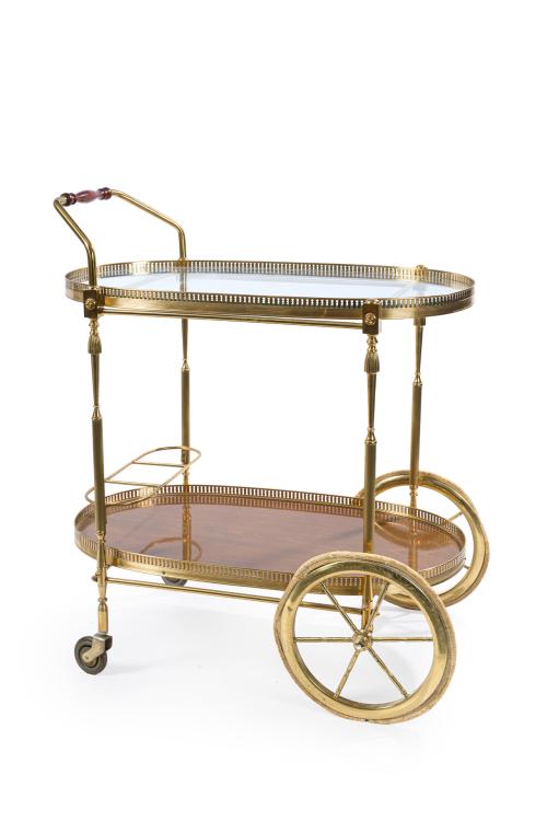 Carrito en latón dorado y cristal con barandilla calada. Do