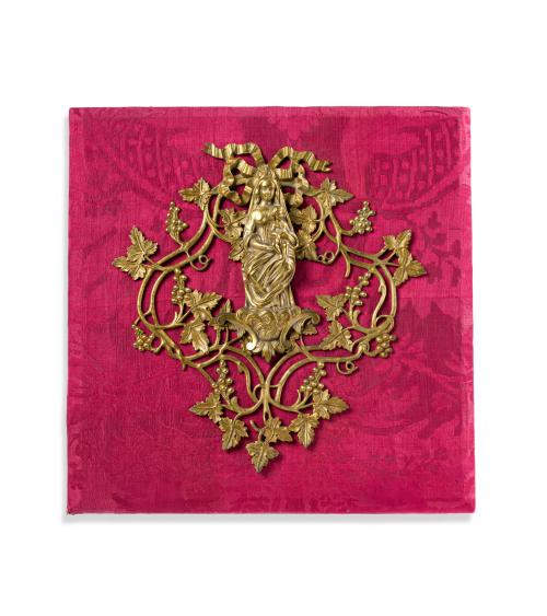Placa decorativa en bronce dorado representado a Virgen con