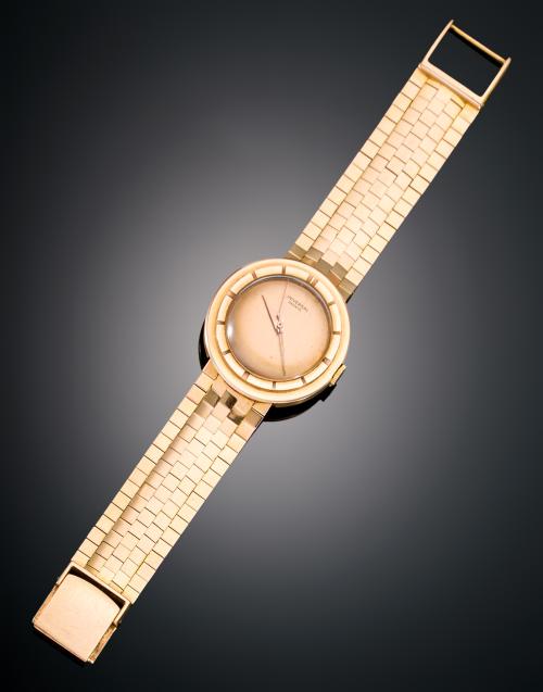RELOJ UNIVERSAL GENEVE EN ORO AMARILLO DE 18 KT. AÑOS 30
