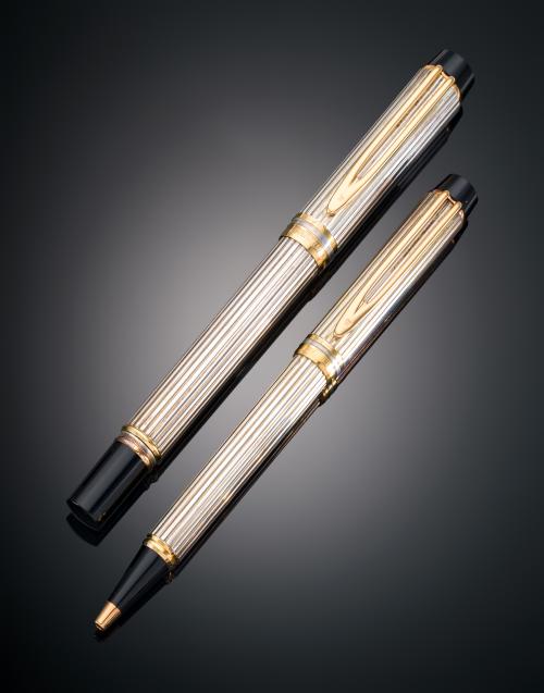 1527   -  <p><span class="object_title">SET DE PLUMA ESTILOGRÁFICA Y BOLÍGRAFO WATERMAN LE MAN EN PLATA Y CHAPADO EN ORO AMARILLO DE 18 KT</span></p>