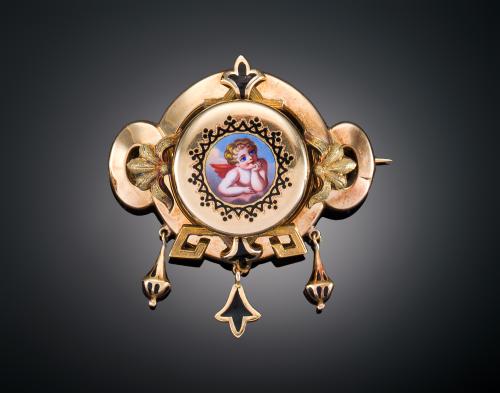 BROCHE ISABELINO CON ESMALTE EN ORO AMARILLO DE 14 KT. CIRC