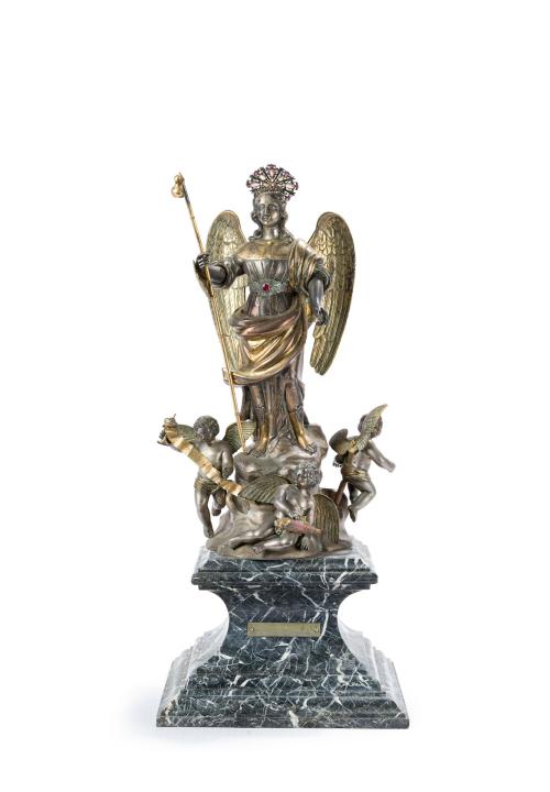 110   -  <p><span class="object_title">JOSÉ MARÍA GONZÁLEZ DEL CAMPO (San Lucar de Barrameda, 1878-Córdoba, 1976).<br/>"San Rafael", 1937.<br/>Escultura en plata dorada y en su color, sobre pedestal en mármol negro veteado. <br/>Firmado y fechado al dorso: "Construido en Córdoba por González del Campo año 1937"<br/>Con cartela e inscripción "CÓRDOBA AL CAUDILLO DE ESPAÑA  1-05-43"</span></p>