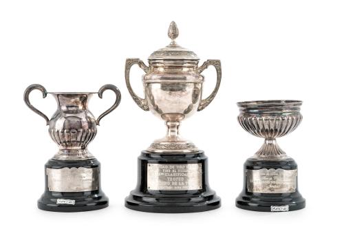 Lote de tres trofeos en plata española punzonada. 